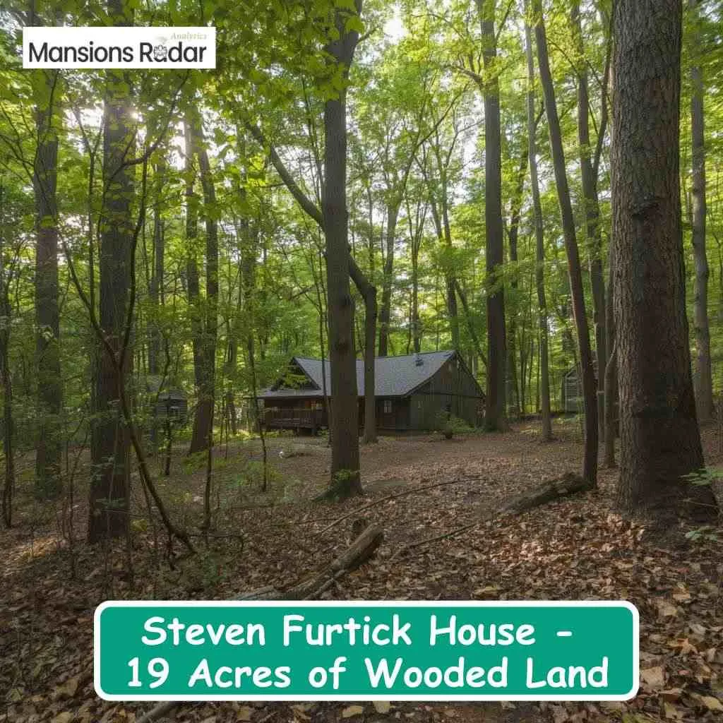A secluded cabin sits nestled within the serene nineteen-acre wooded grounds of the steven furtick house.